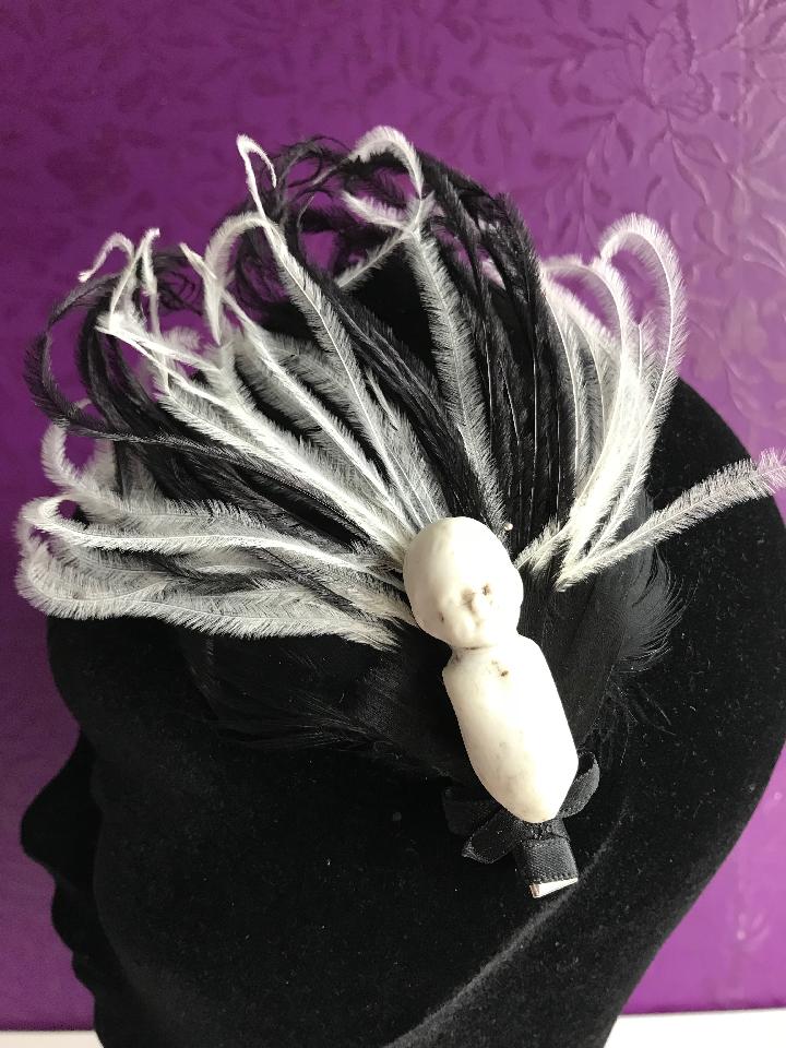 IMAGE - Black and white featherpad hairpin with antique porcelain doll body.