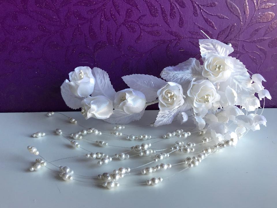 IMAGE - Small vintage bridal hairpiece.
These are the only items on the site not handmade by me. 
They are an old stock and have never been worn. 
Fixes to the hair with a comb.