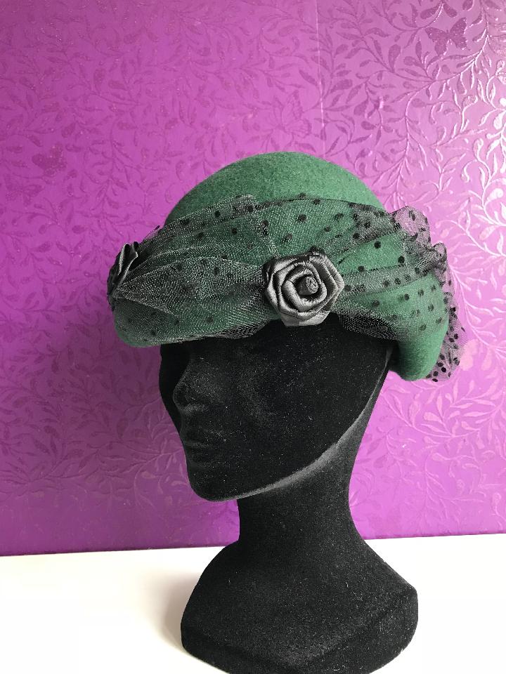 IMAGE - Handblocked green felt hat with black dotted tulle and handmade ribbon roses.
