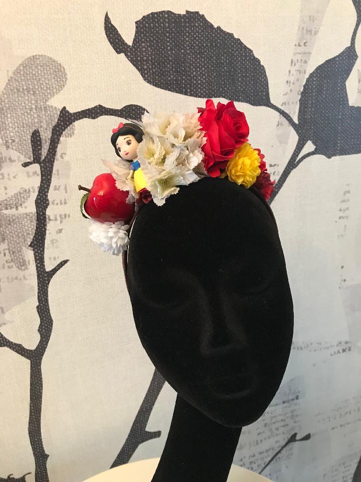 IMAGE - Brown satin headband with white, yellow and red flowers. Decorated with Snowwhite figure and red glossy apple.