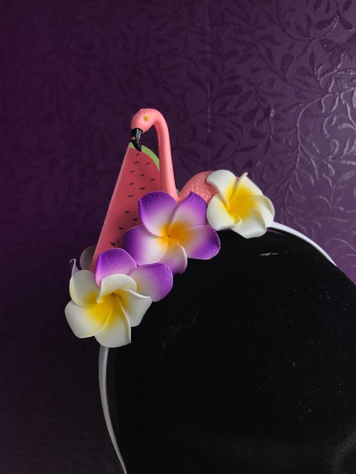 IMAGE - White satin headband with watermelon, flamingo and white and purple flowers.